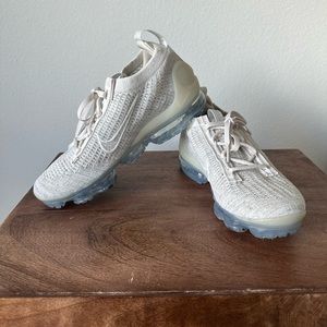 Size 7 Nike running shoes. Never worn!